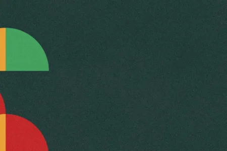 Geometric Christmas tree with a gold star on a dark green background